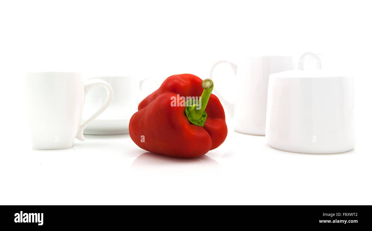 Red pepper in modern white kitchen setting Stock Photo
