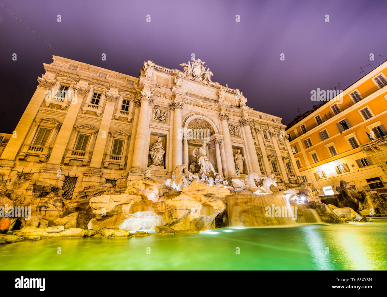Fountain Trevi during evening hours in Rome Stock Photo Alamy