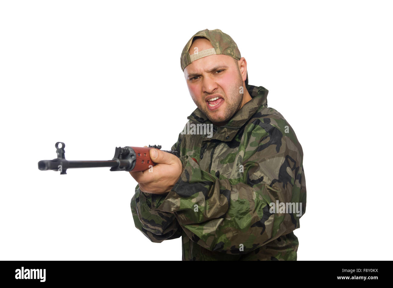 Young man in soldier uniform holding gun isolated on white Stock Photo ...