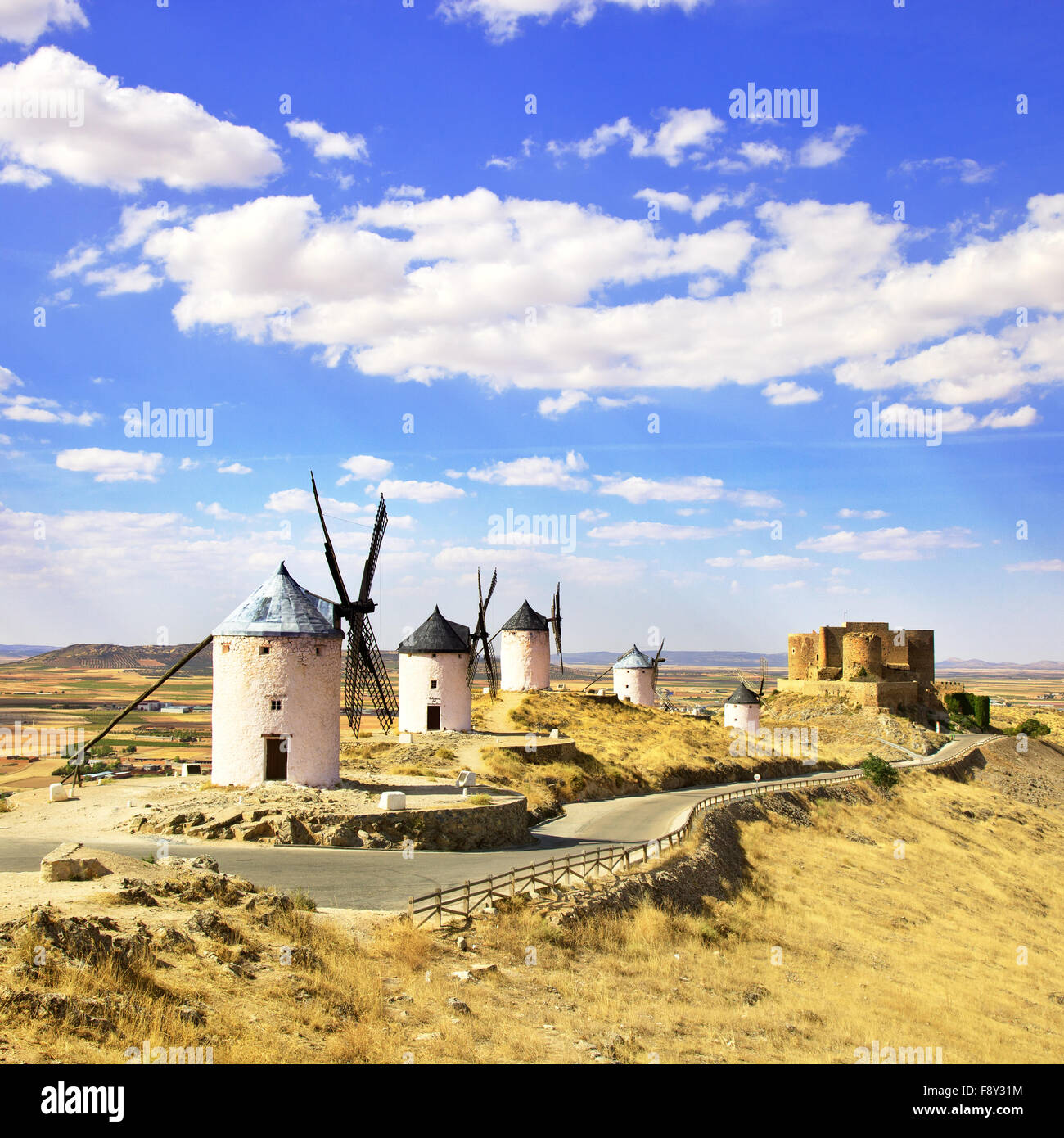 Cervantes Don Quixote windmills and Consuegra castle. Castile La Mancha, Spain, Europe Stock Photo