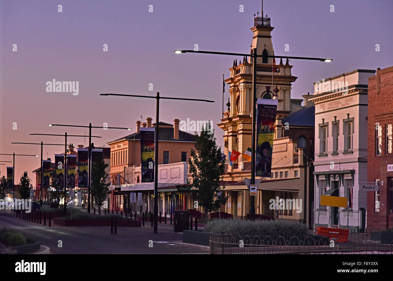 Glen innes main street at dusk showing the historic town hall Stock