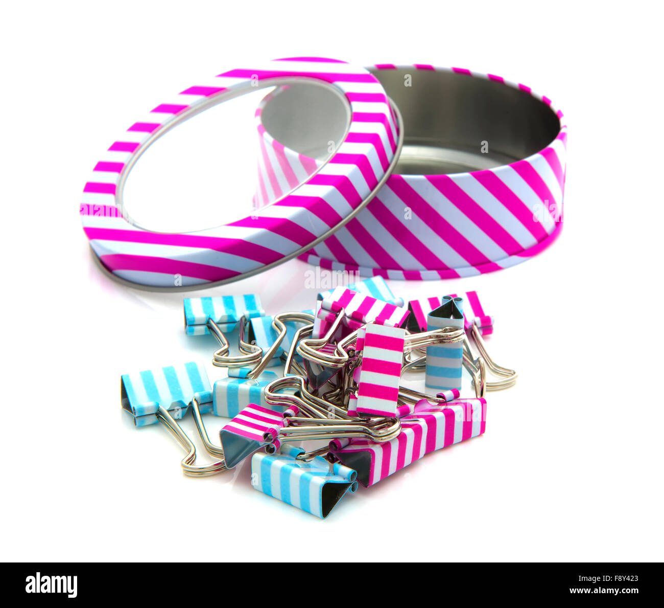 Stripey Tin with foldback clip's of a white background Stock Photo