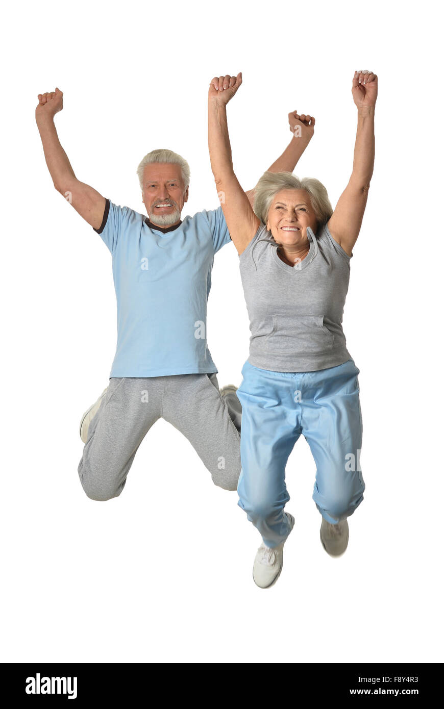 Senior couple jumping Stock Photo