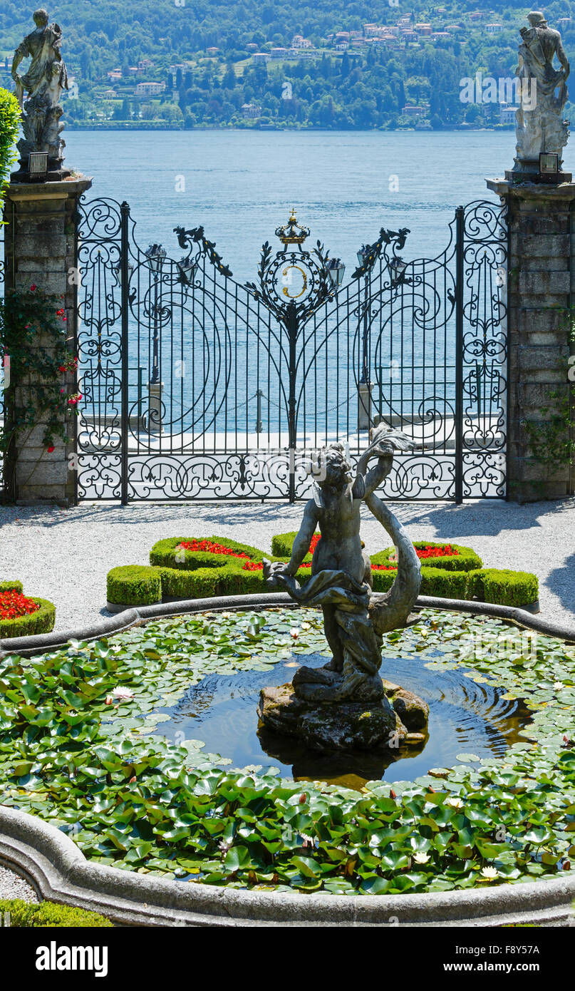 Magnificent park with fountain, statues, flower beds. Villa Carlotta, Italy, Tremezzo, Lake Como.  Built in 1690. Stock Photo
