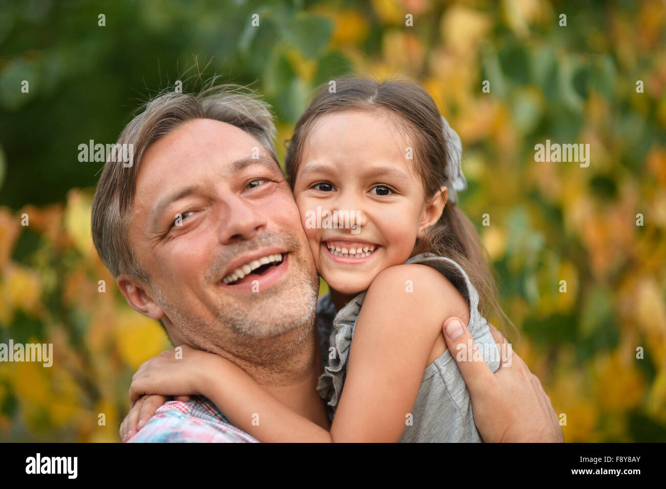 father with daughter in summer park Stock Photo - Alamy