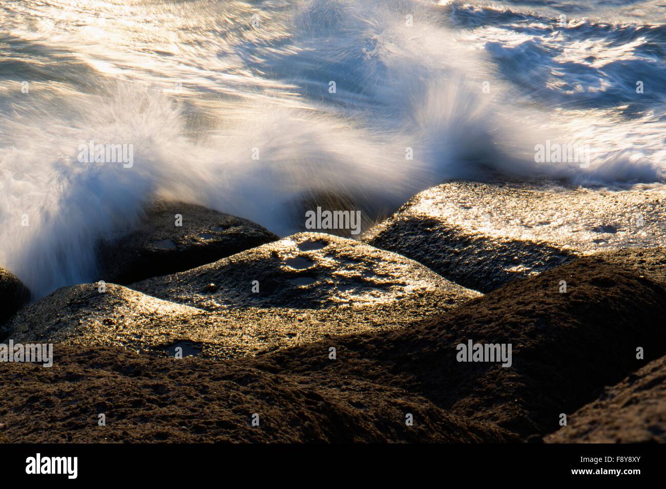 waves breaking on the rocks Stock Photo - Alamy