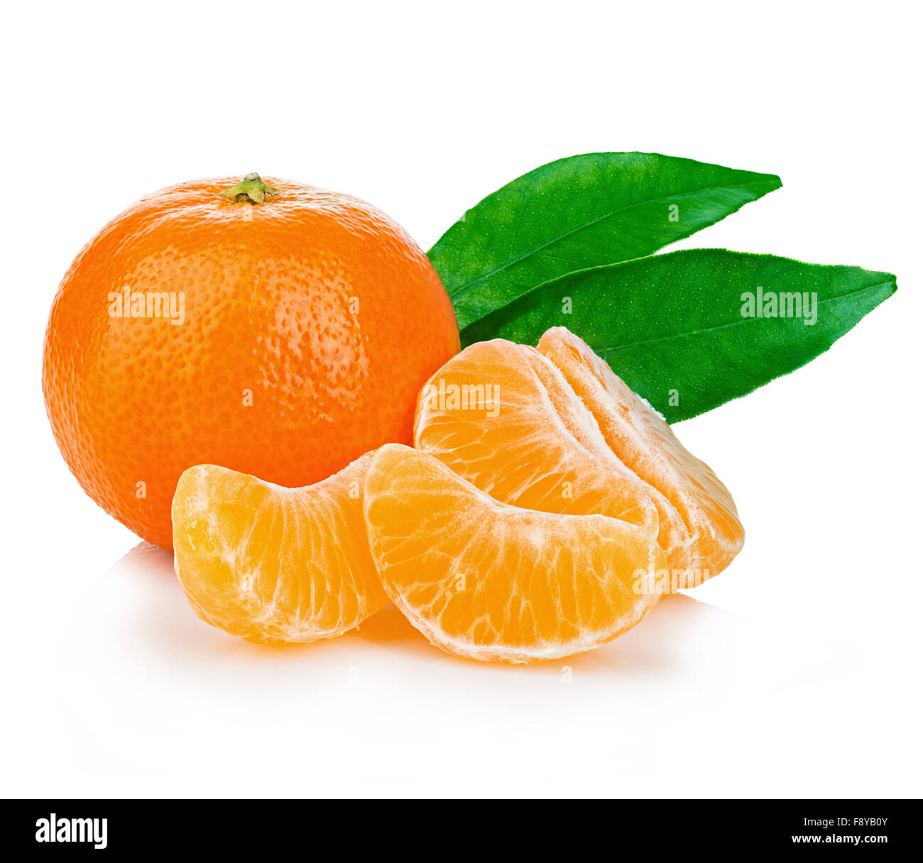 Ripe mandarin with green leaves close-up on a white background. Stock Photo