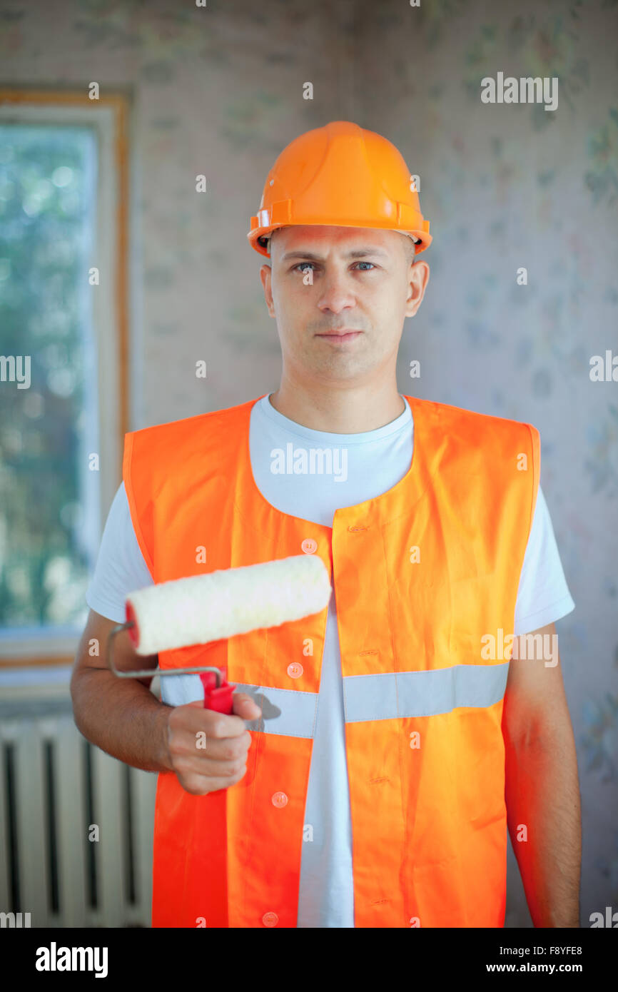 house painters with paint roller is ready for operation Stock Photo Alamy