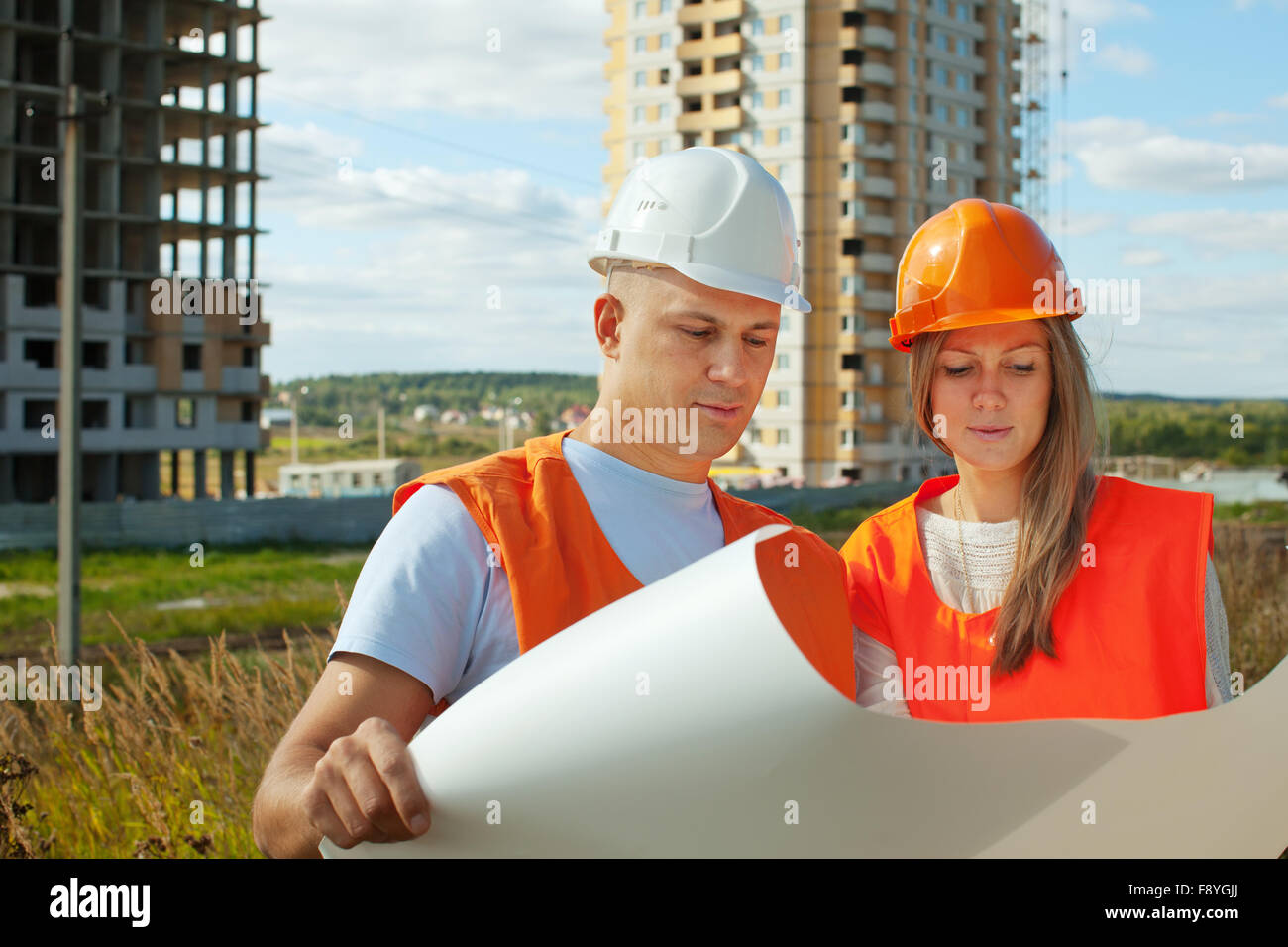 Two Construction Works Two people partner build business team hi-res stock photography and ...