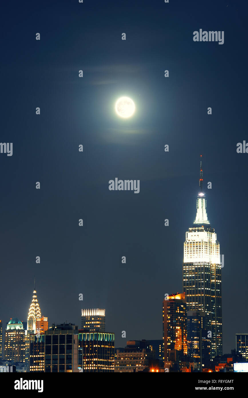 NEW YORK CITY, NY - SEP 20: Empire State Building with super moon on ...