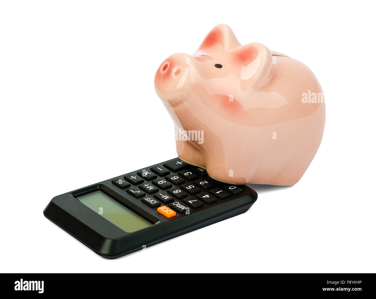 Piggy bank with calculator on white Stock Photo - Alamy