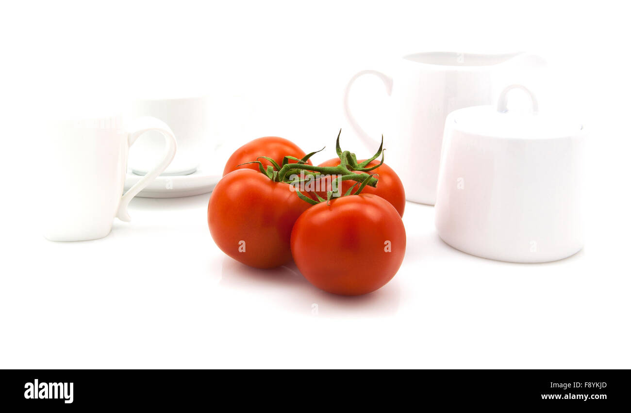 Fresh Vine tomatoes in a modern white kitchen setting Stock Photo Alamy