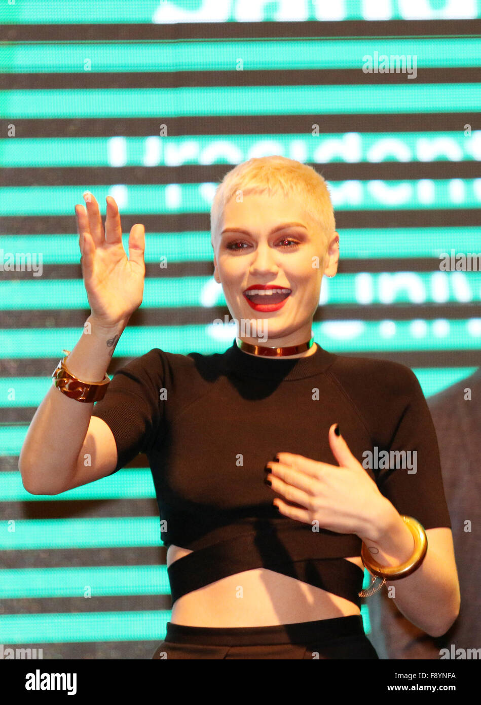 Phnom Penh, Cambodia. 12th Dec, 2015. British pop singer Jessie J (C) gestures in Phnom Penh, Cambodia, Dec. 12, 2015. Jessie J performed at a concert here Saturday night, attracting a huge crowd of fans. Credit:  Sovannara/Xinhua/Alamy Live News Stock Photo
