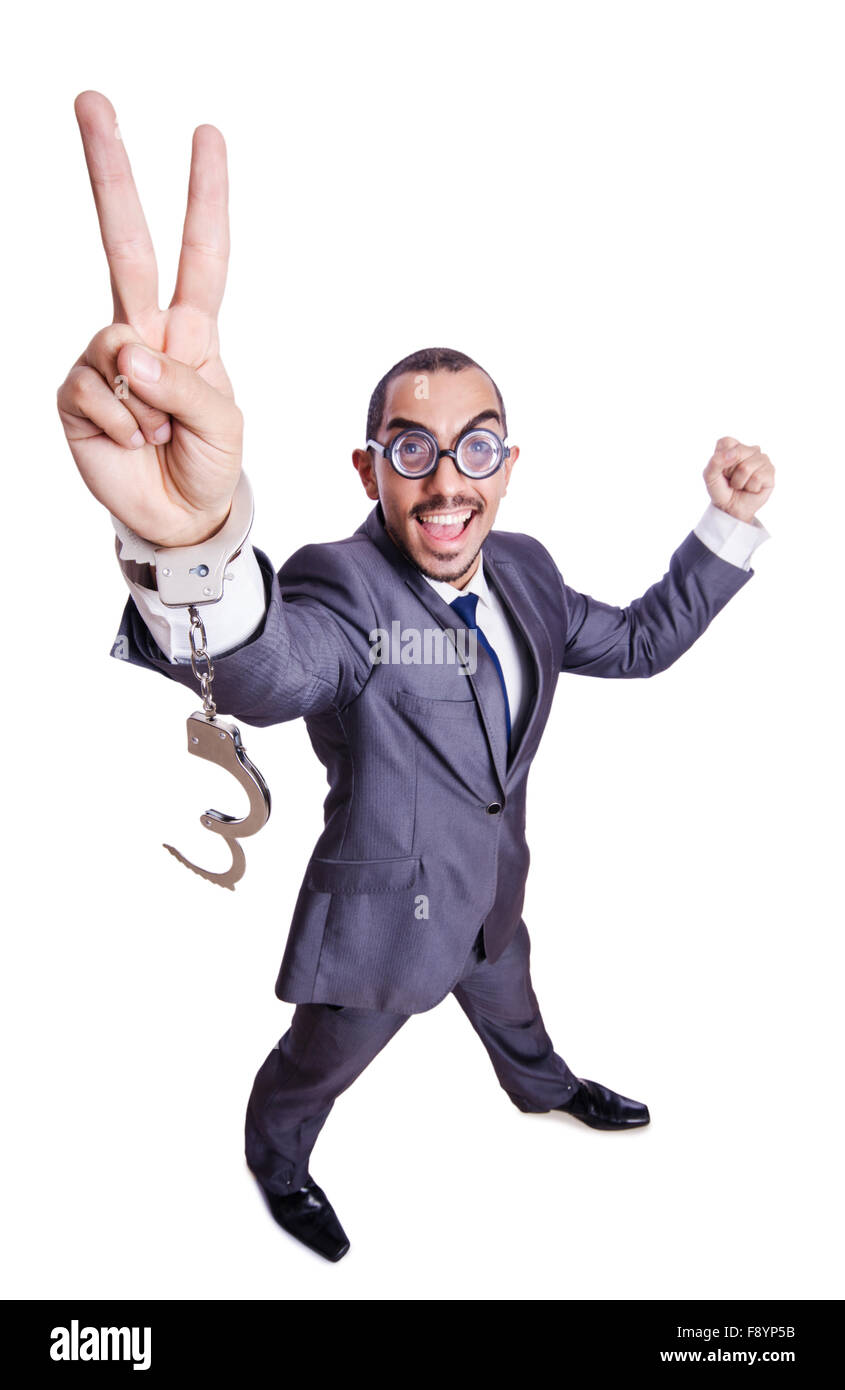 Funny businessman with handcuffs on white Stock Photo Alamy
