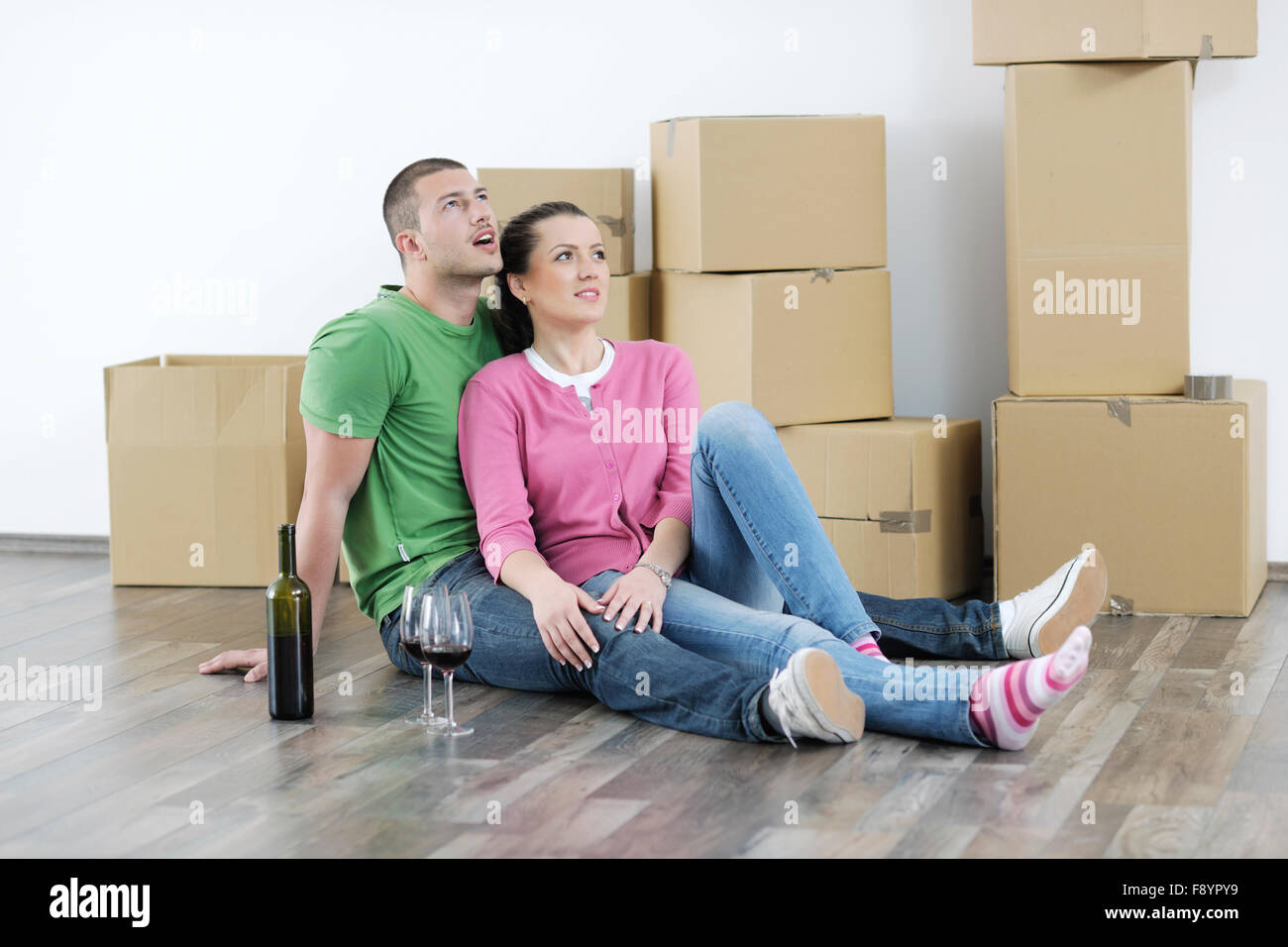 happy Young couple moving in new home Stock Photo - Alamy