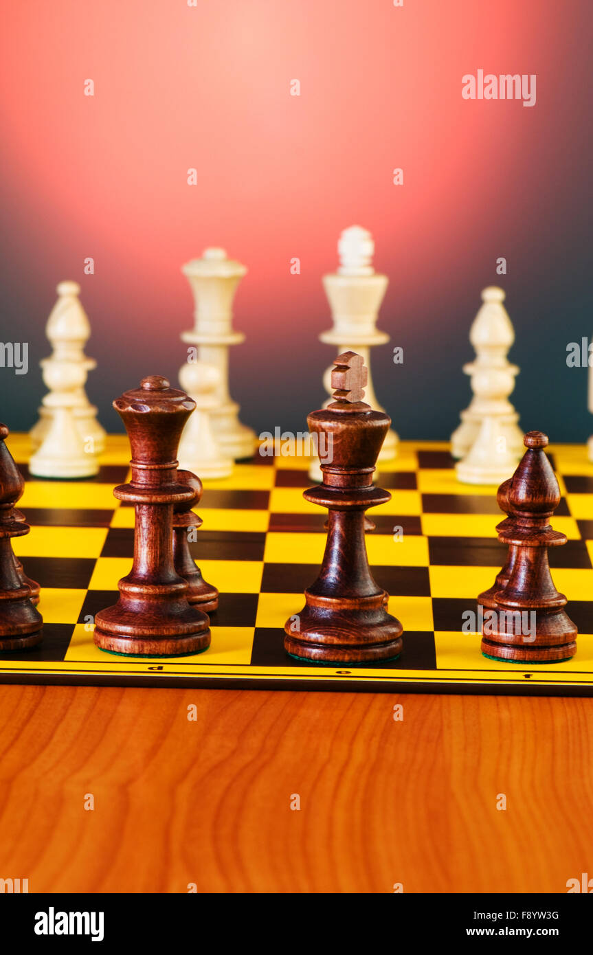 Chess concept with pieces on the board Stock Photo - Alamy