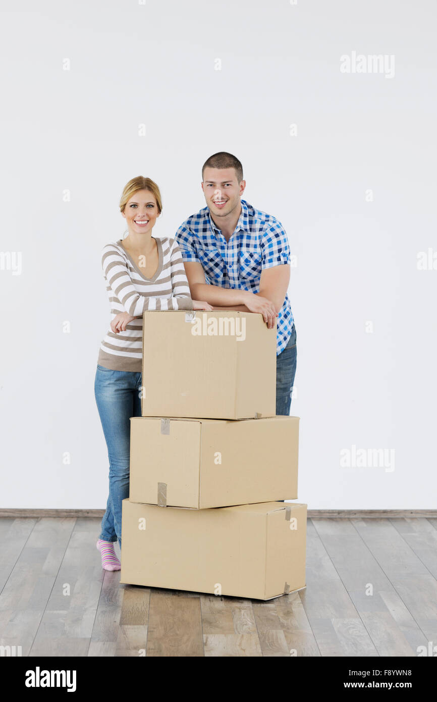 happy Young couple moving in new home Stock Photo - Alamy