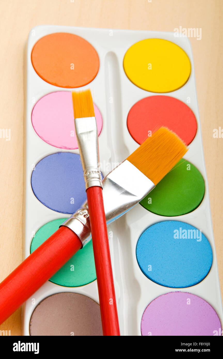 Art concept with painters palette and paint brush Stock Photo Alamy