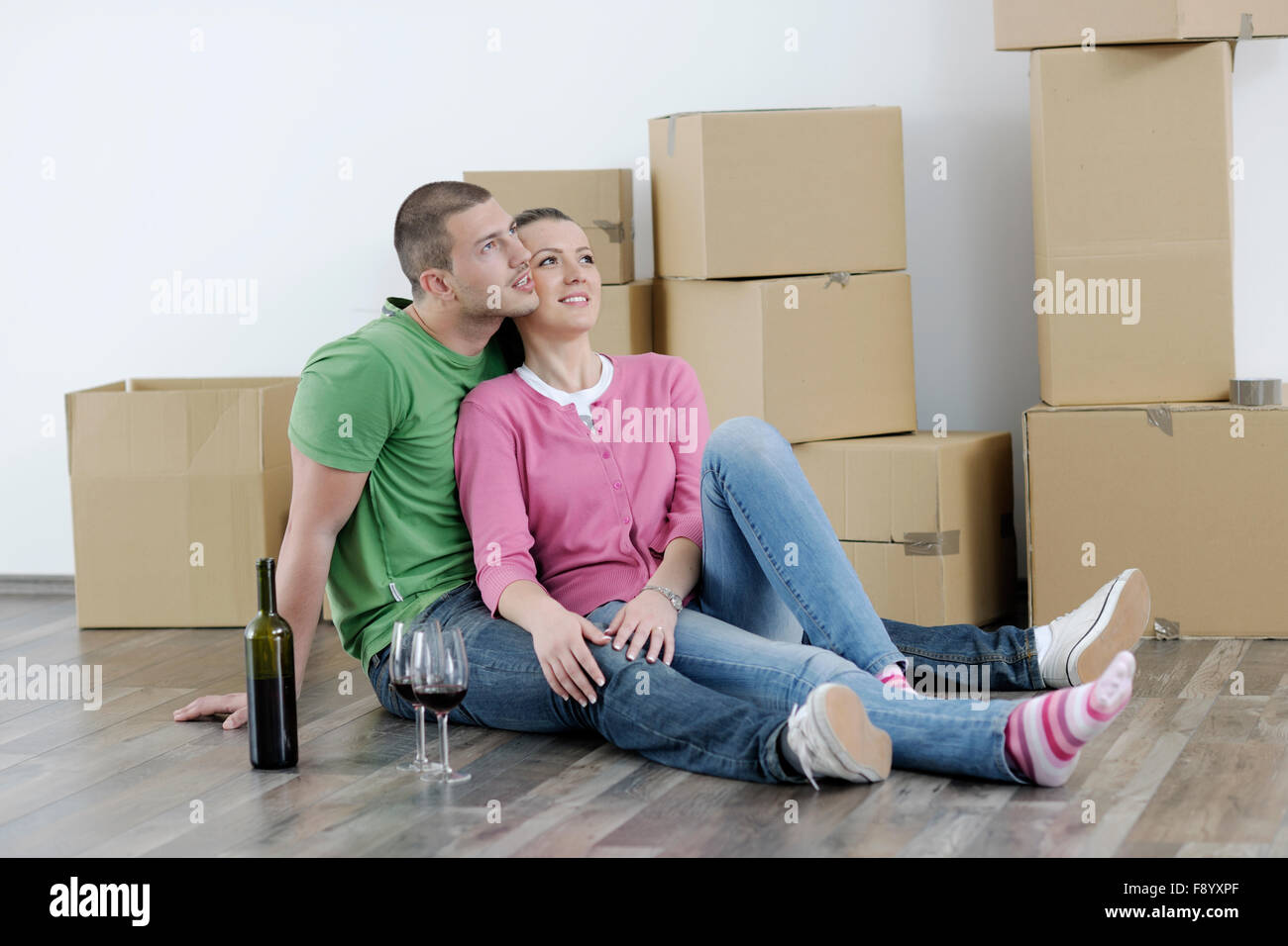 happy Young couple moving in new home Stock Photo - Alamy