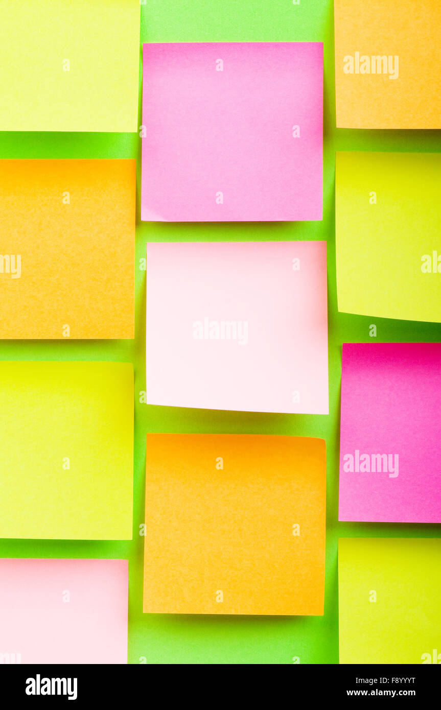 Reminder notes on the bright colorful paper Stock Photo - Alamy