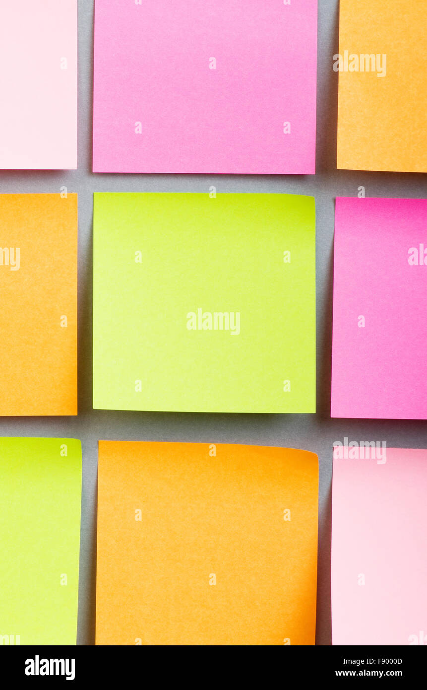 Reminder notes on the bright colorful paper Stock Photo - Alamy