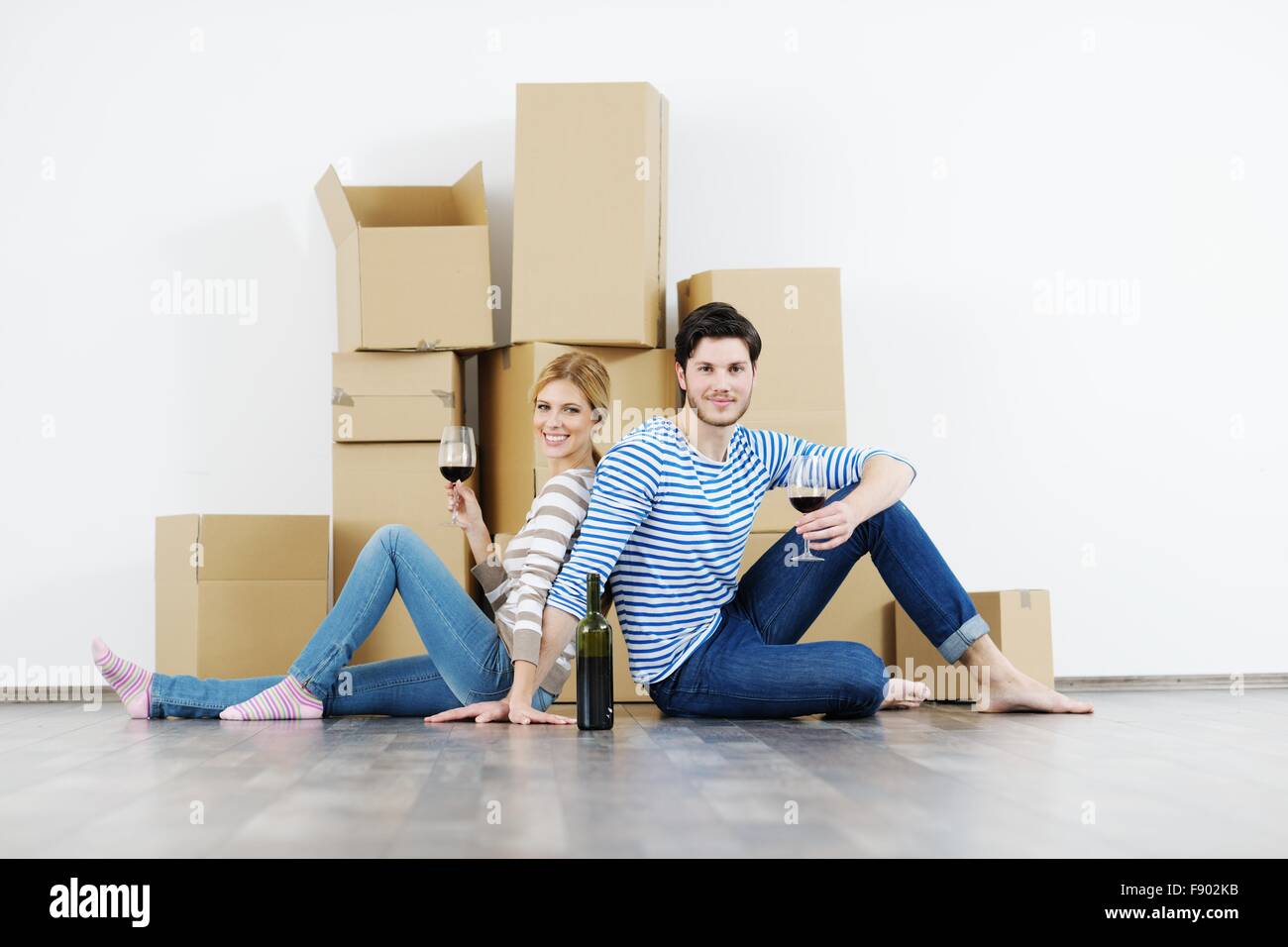 happy Young couple moving in new house Stock Photo - Alamy