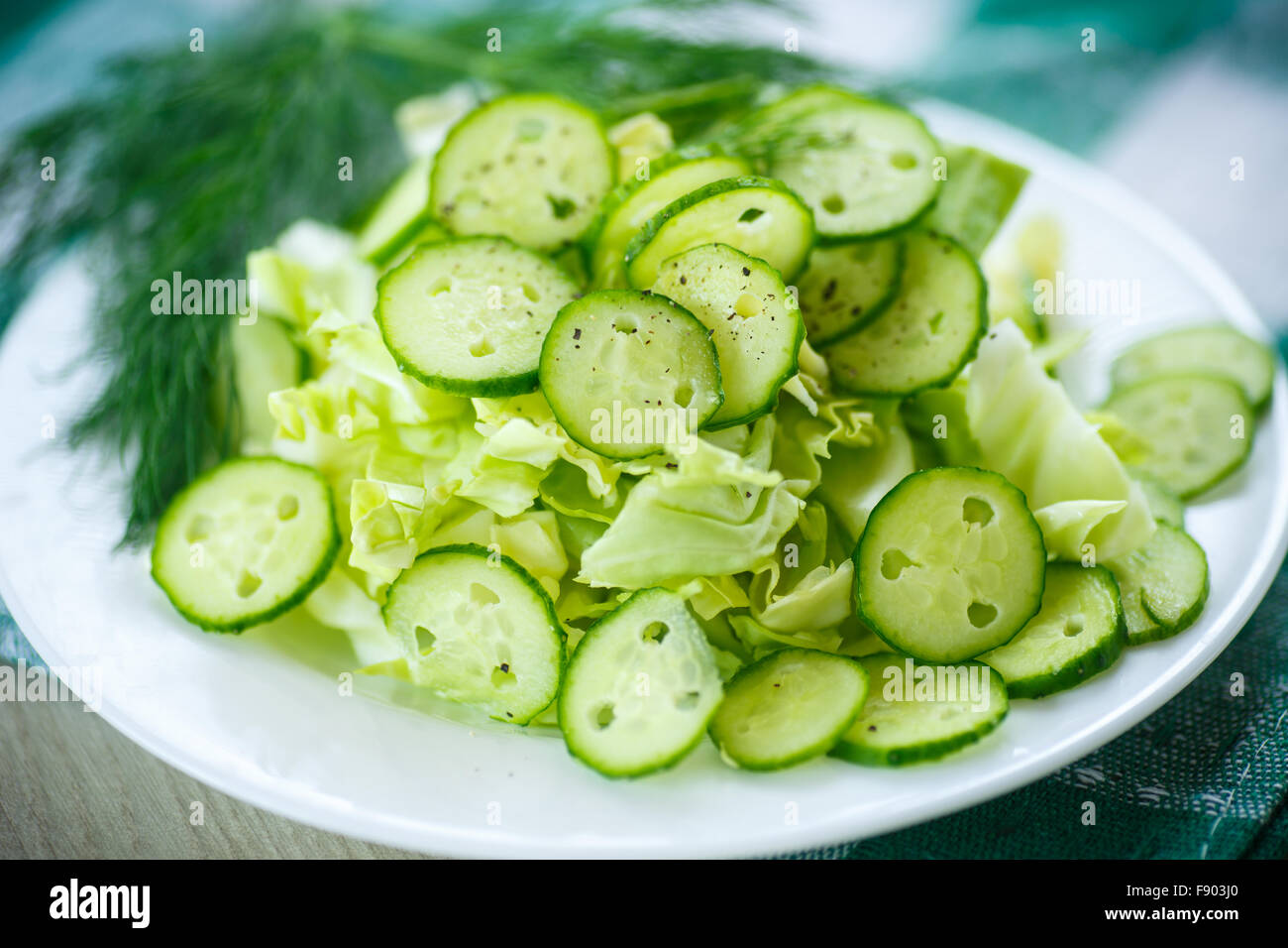spring salad with cabbage and cucumbers Stock Photo - Alamy