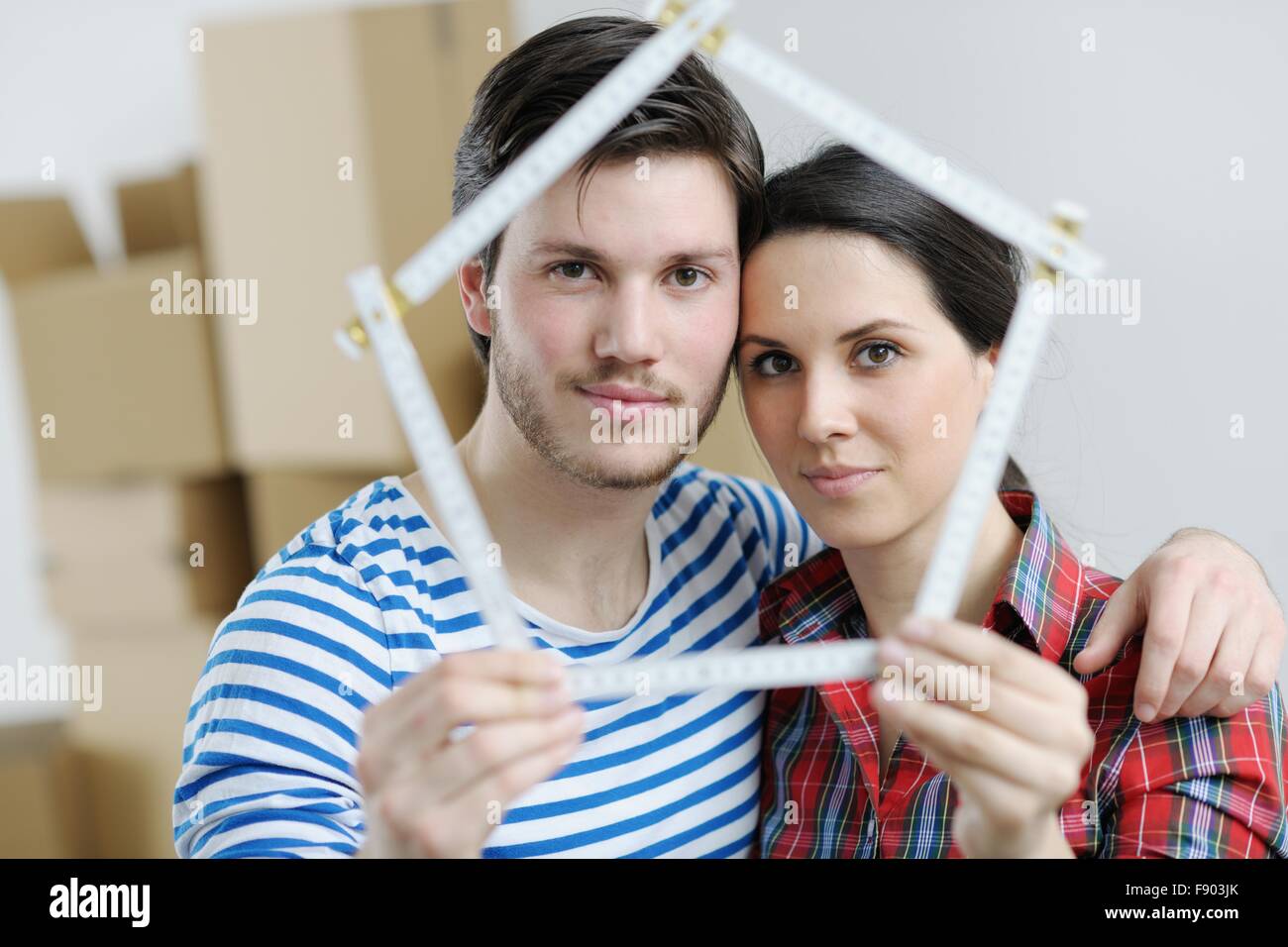 happy Young couple moving in new house Stock Photo - Alamy