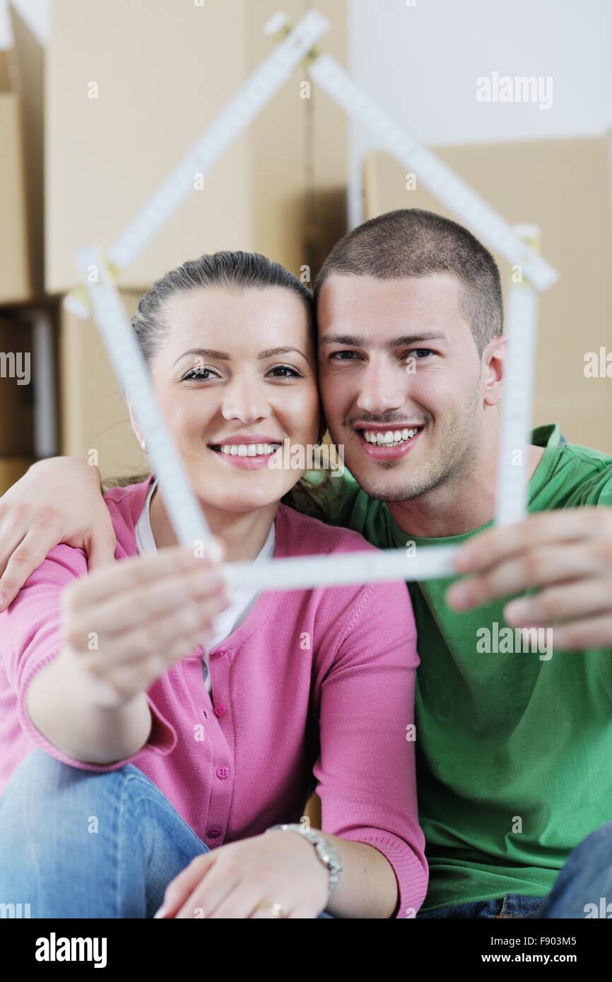 happy Young couple moving in new house Stock Photo - Alamy