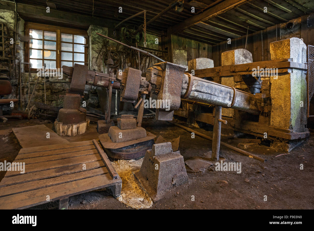 Interior, hammers, workshop in a historical hammer mill, Bad Oberdorf in Bad Hindelang, Allgäu, Bavaria, Germany Stock Photo