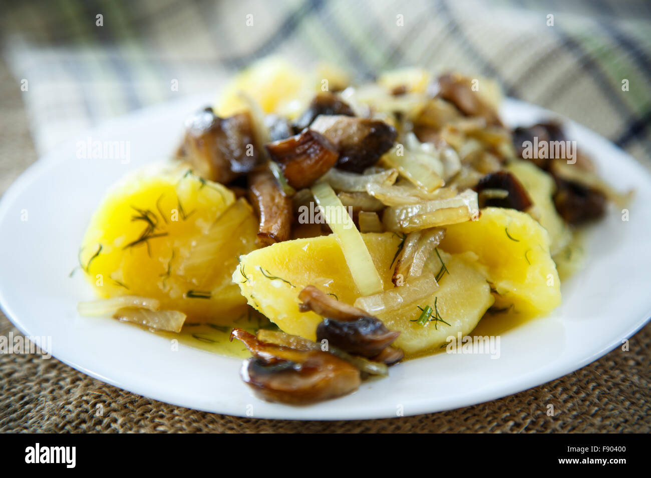 Boiled potatoes with fried mushrooms Stock Photo Alamy