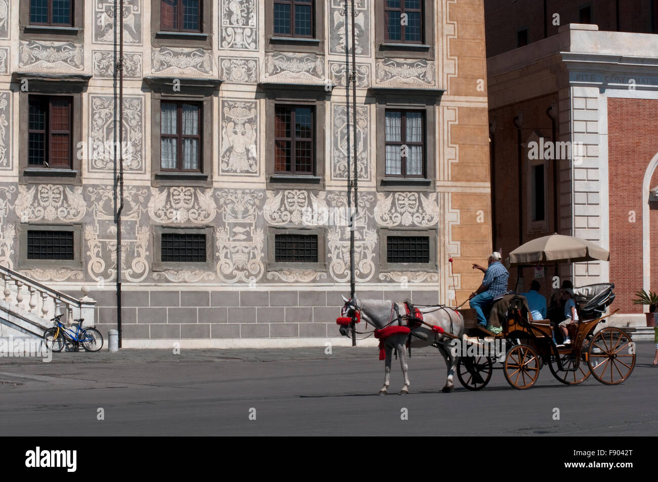 Italy, Tuscany, Pisa, Piazza dei Cavalieri, Palazzo della Carovana Scuola Normale University, Carriage Stock Photo