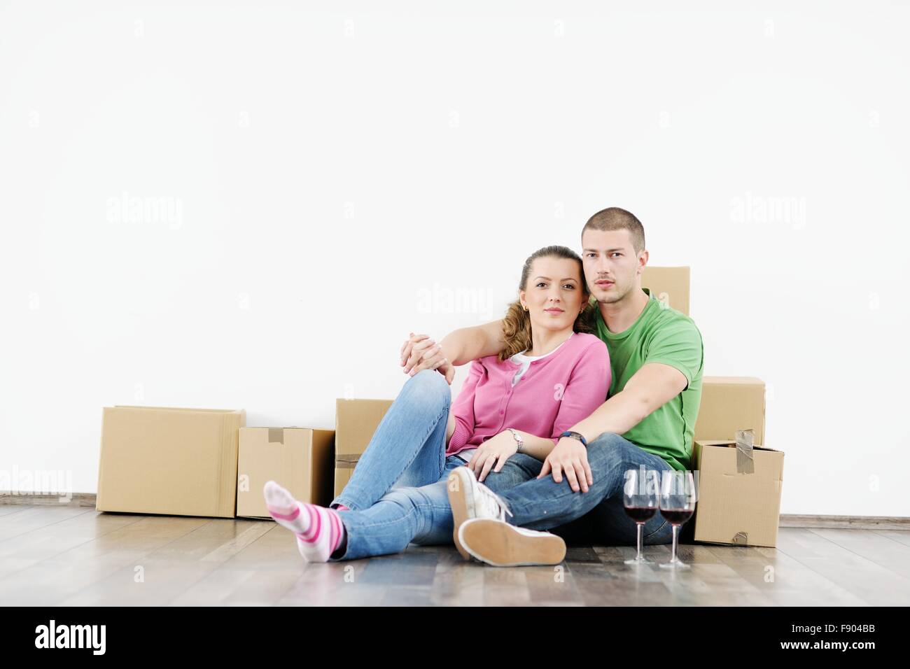 happy Young couple moving in new house Stock Photo - Alamy