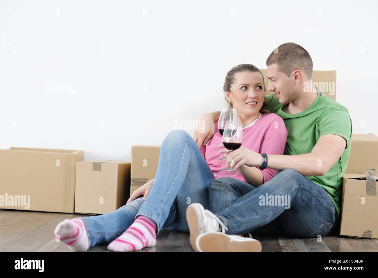 happy Young couple moving in new house Stock Photo - Alamy