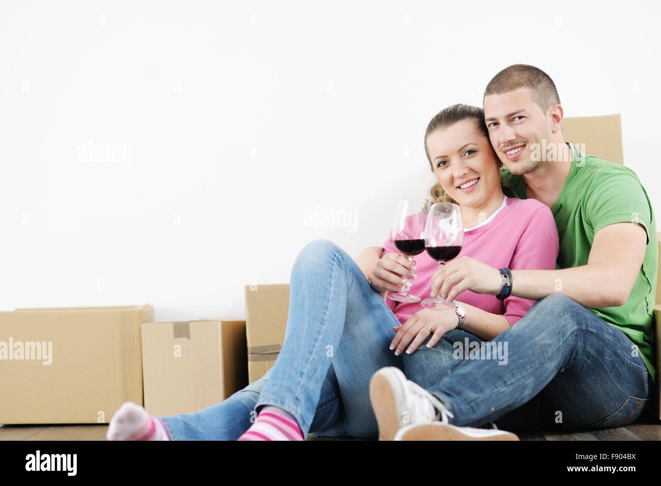 happy Young couple moving in new house Stock Photo - Alamy
