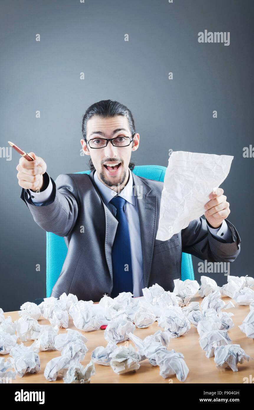 Man buried in paperwork hi-res stock photography and images - Alamy