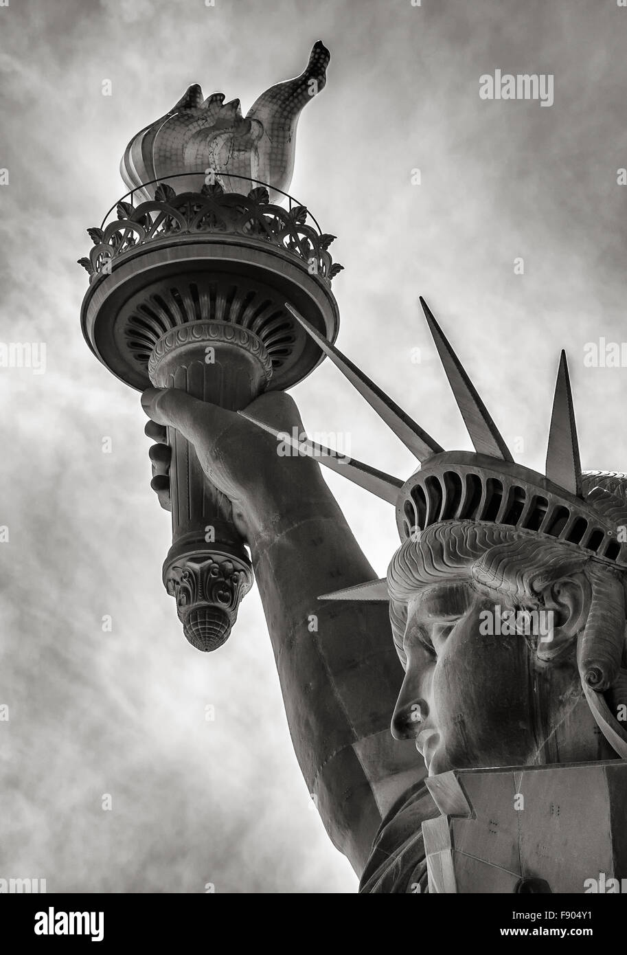 Black & White detail of torch, crown and profile of the Statue of Liberty, Liberty Island, New York City Stock Photo