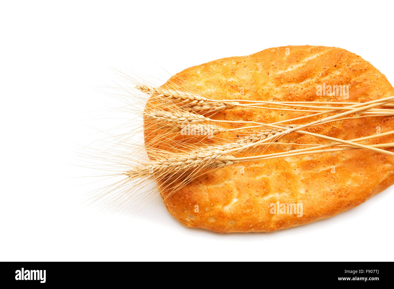 Bread and wheat ears isolated on white Stock Photo - Alamy