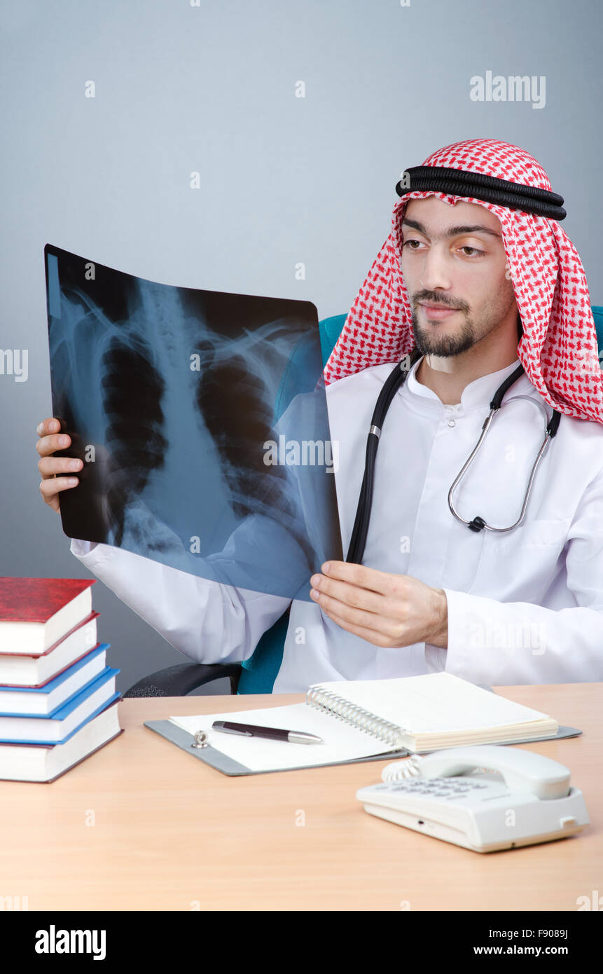 Arab doctor with x-ray print Stock Photo - Alamy