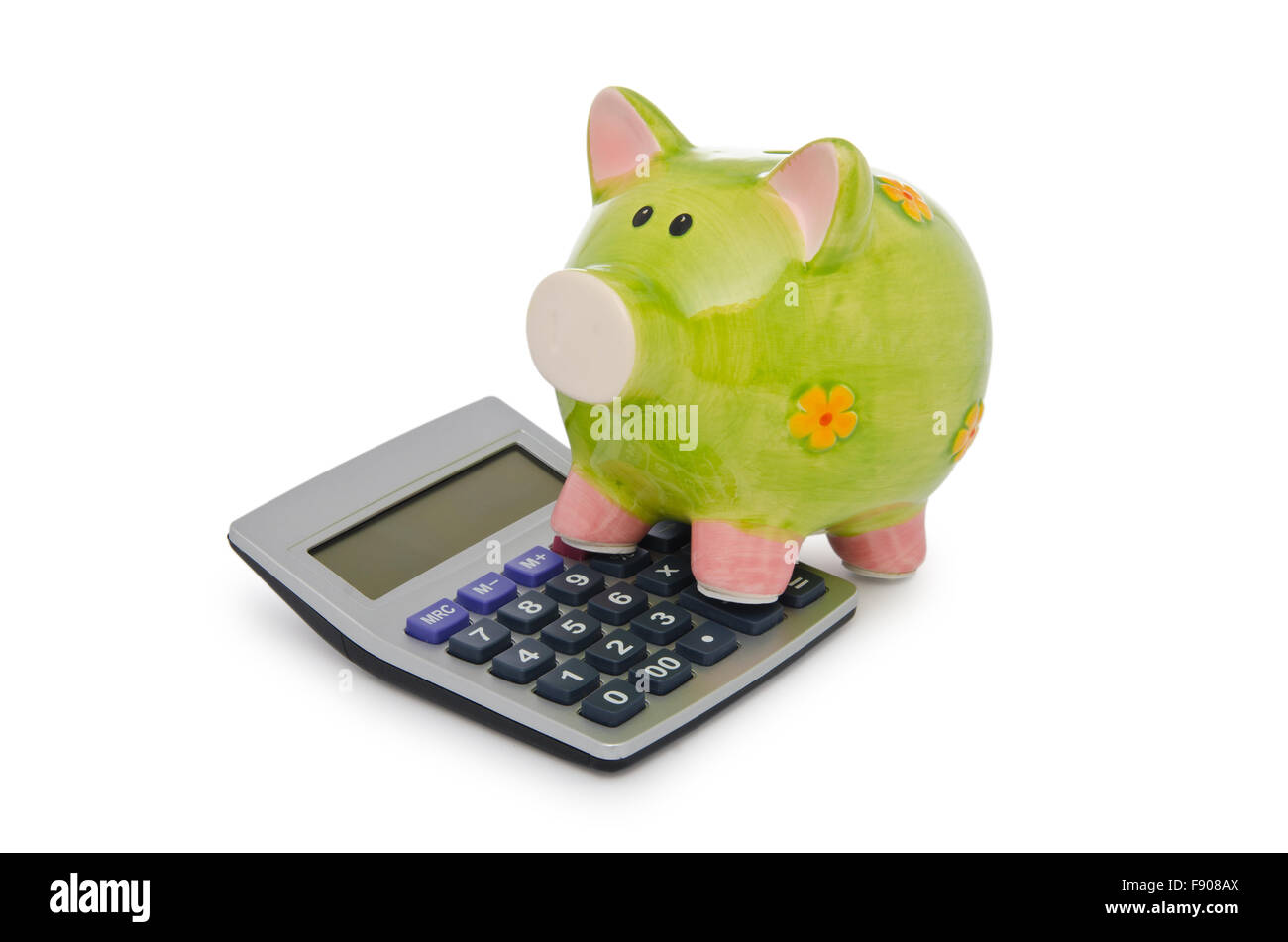 Calculator and piggy bank on white Stock Photo - Alamy