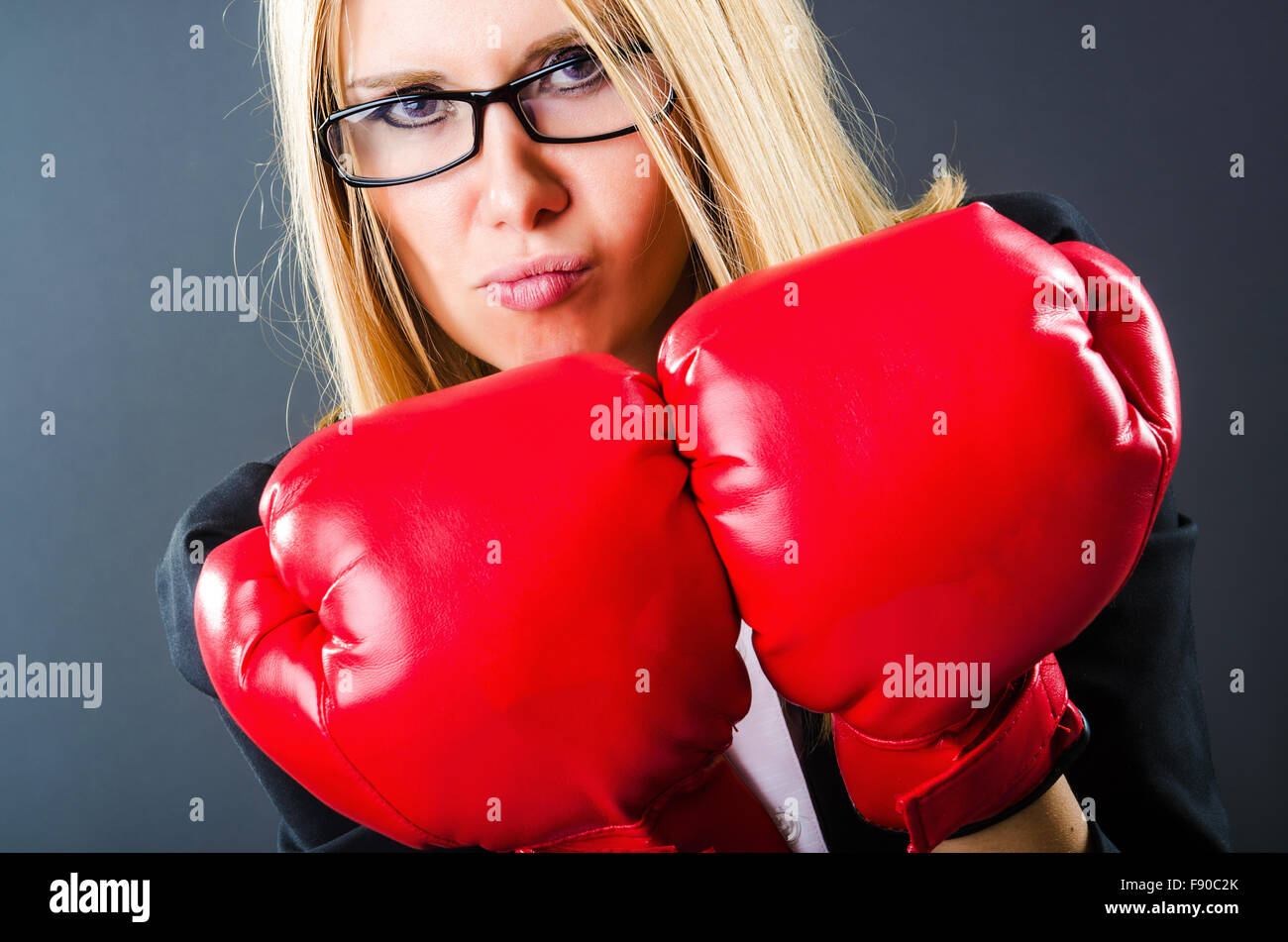 Woman boxer in dark room Stock Photo - Alamy
