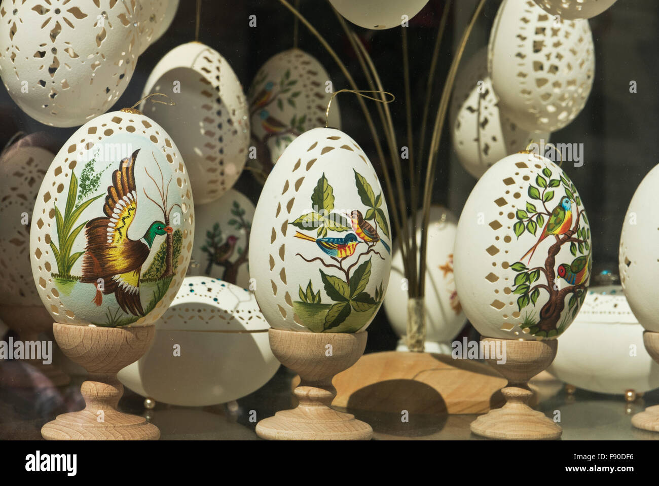 Colourful birds painted on delicate empty egg shells on sale, Budapest