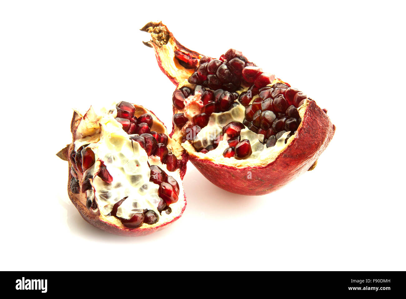 Pieces of pomegranate on a white background Stock Photo