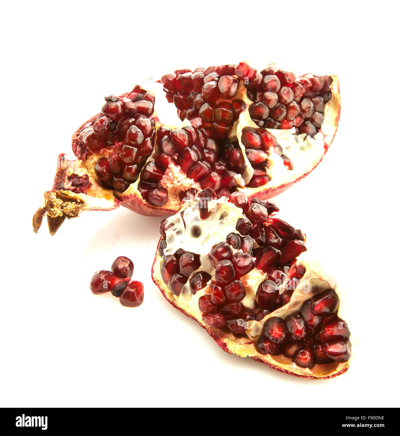 Pieces of pomegranate on a white background Stock Photo