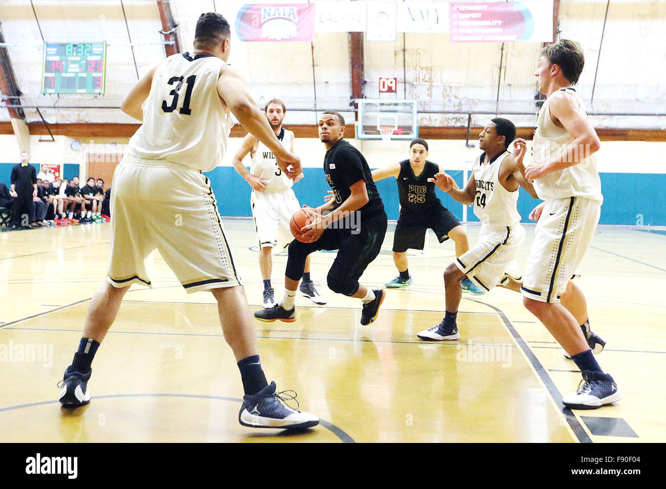 Angwin, CA, USA. 11th Dec, 2015. Pacific Union College's Mike Hill drives towards the basket during the Pioneers game against Johnson & Wales University at Pacific Union College in Angwin on Friday. © Napa Valley Register/ZUMA Wire/Alamy Live News Stock Photo