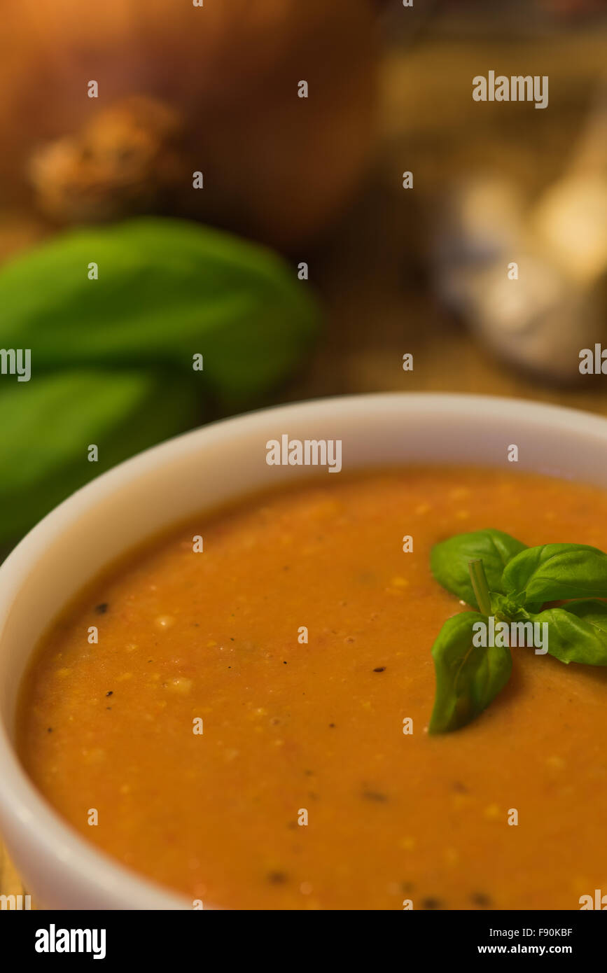 Tomato soup with basil Stock Photo