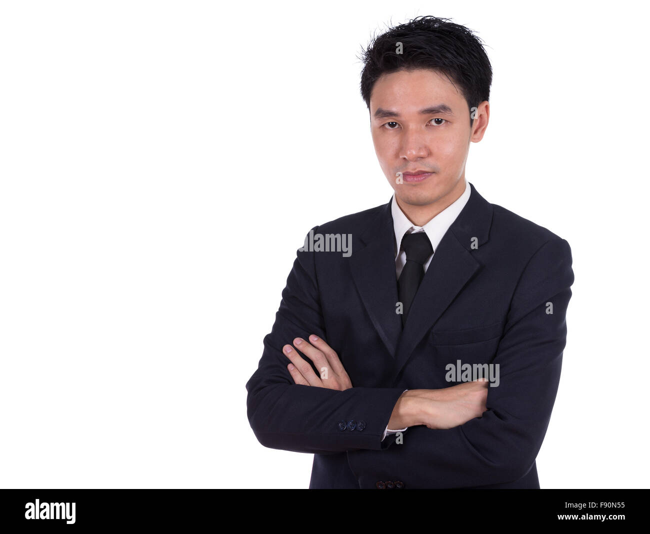 portrait of business man with arms crossed isolated on white background ...