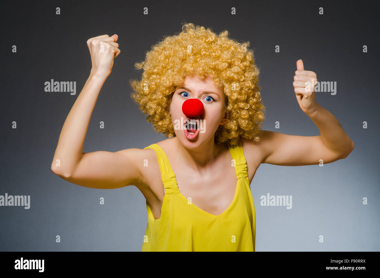 Funny woman in clown dressing Stock Photo Alamy