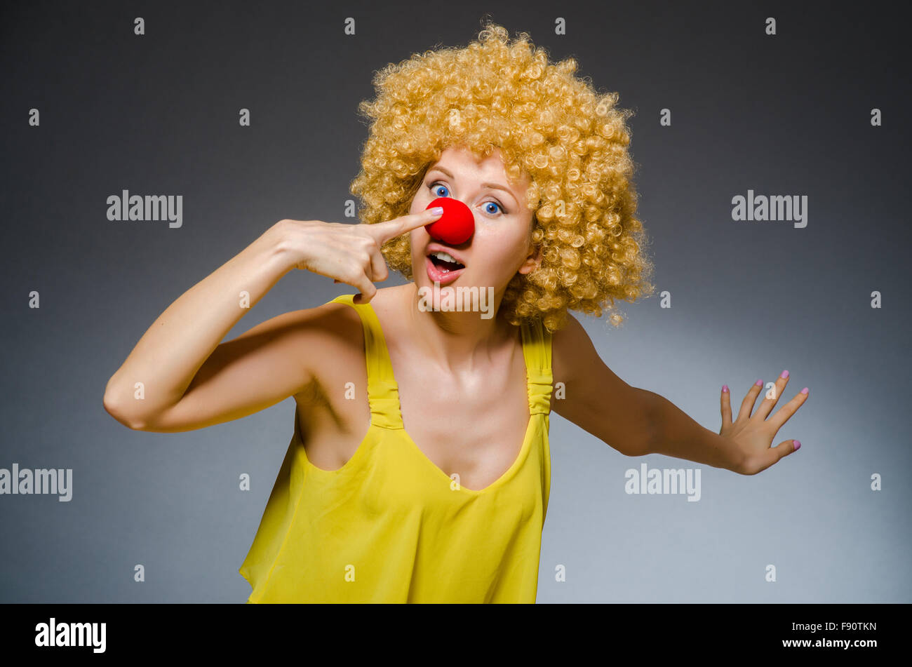 Funny woman in clown dressing Stock Photo Alamy