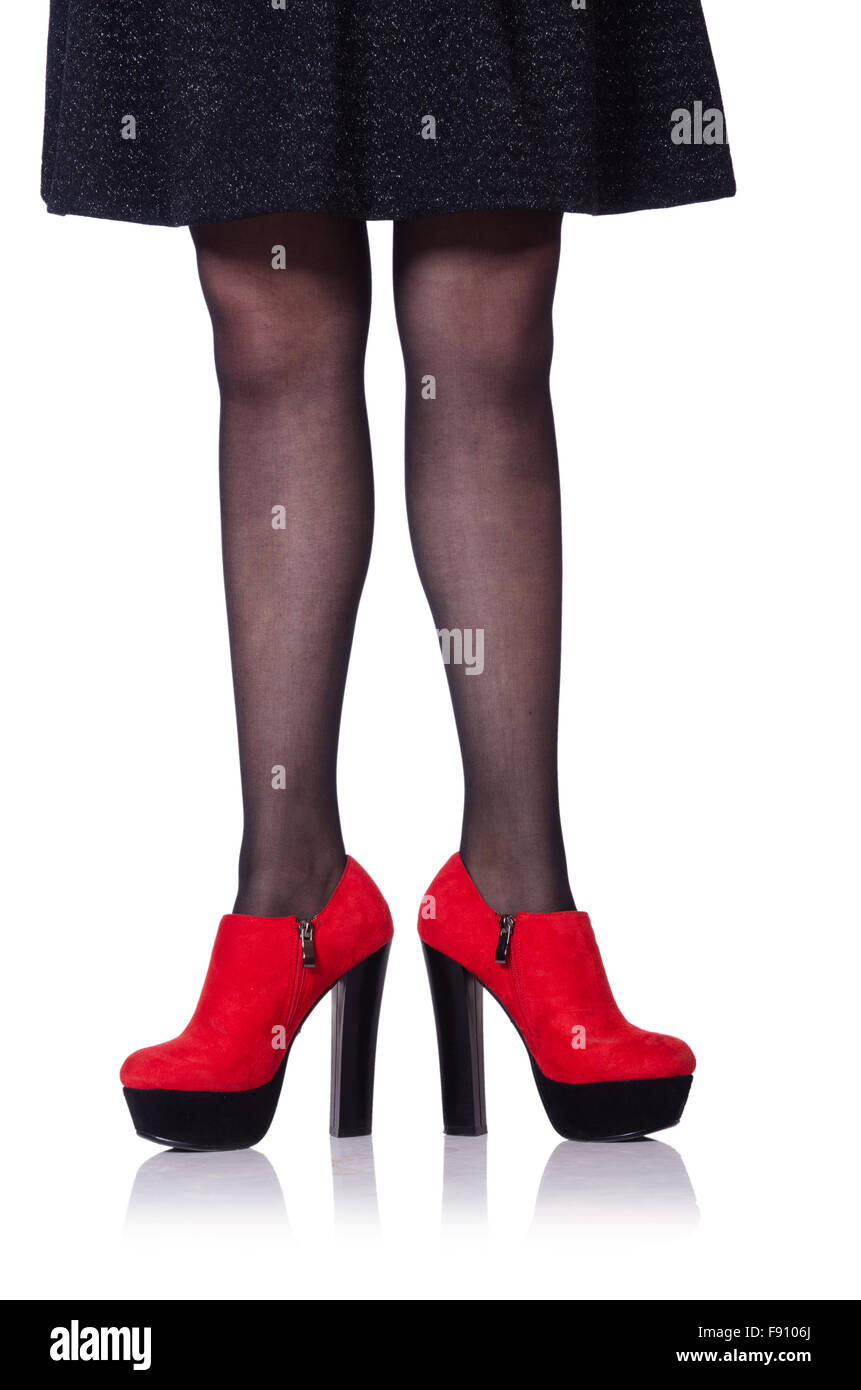 Woman legs with red shoes isolated on the white Stock Photo